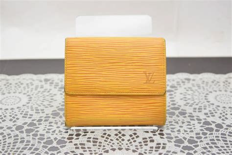 louis vuitton wallet yellow inside.